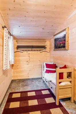 Ein Bett oder Betten in einem Zimmer der Unterkunft Knusperhauschen Sonnegg