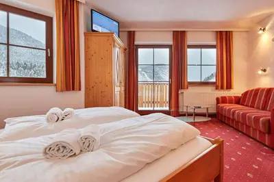 Ein Bett oder Betten in einem Zimmer der Unterkunft Gut Vögeihof