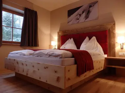Ein Bett oder Betten in einem Zimmer der Unterkunft Sportlerhof - Alimann UaB