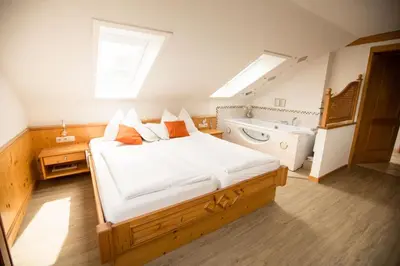 Ein Bett oder Betten in einem Zimmer der Unterkunft Pension Knoll