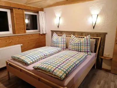 Ein Bett oder Betten in einem Zimmer der Unterkunft Greenheart Aussee