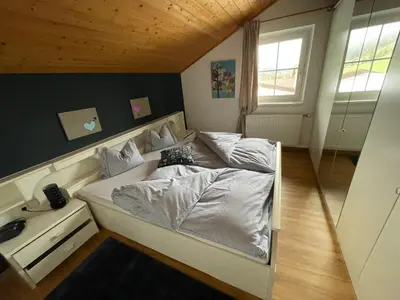 Ein Bett oder Betten in einem Zimmer der Unterkunft Ferienwohnung Margit Baier