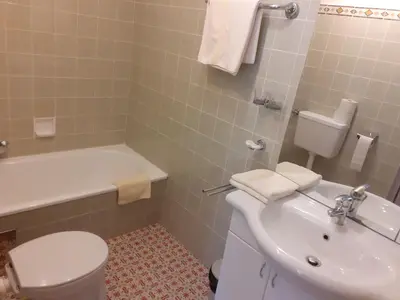 Ein Badezimmer in der Unterkunft Pension Hirlatz