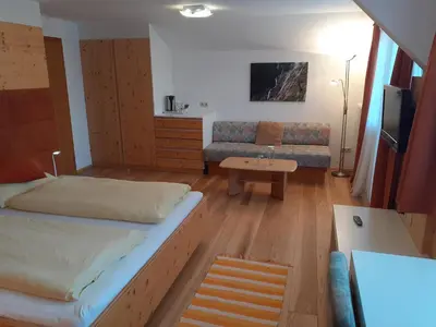 Ein Bett oder Betten in einem Zimmer der Unterkunft Pension Hirlatz