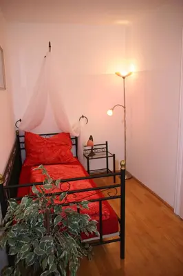 Ein Bett oder Betten in einem Zimmer der Unterkunft Stadtappartements Oppeneiger