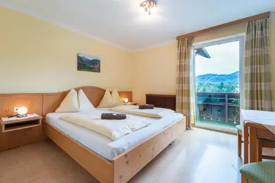 Ein Bett oder Betten in einem Zimmer der Unterkunft Bio Bauernhof Eggerhof