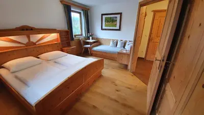 Ein Bett oder Betten in einem Zimmer der Unterkunft Ferienwohnungen Haus-Holzer