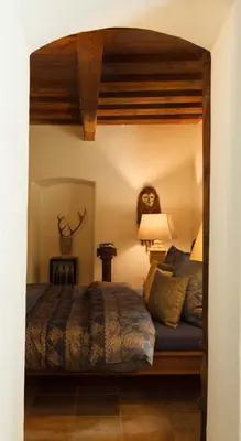 Ein Bett oder Betten in einem Zimmer der Unterkunft Living History (adults only)
