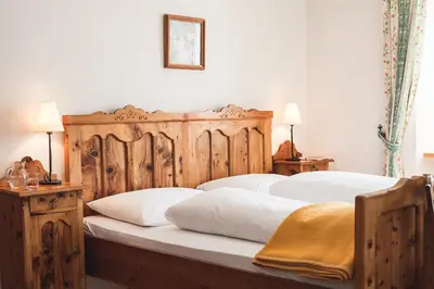 Ein Bett oder Betten in einem Zimmer der Unterkunft Hotel-Gasthof Weitgasser