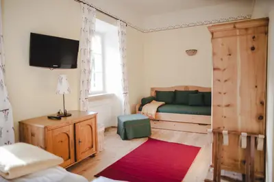 Ein Bett oder Betten in einem Zimmer der Unterkunft Hotel-Gasthof Weitgasser