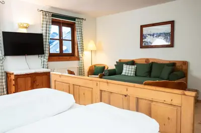 Ein Bett oder Betten in einem Zimmer der Unterkunft Hotel-Gasthof Weitgasser