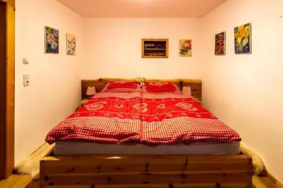 Ein Bett oder Betten in einem Zimmer der Unterkunft Ferienappartement am Leisnitzbach