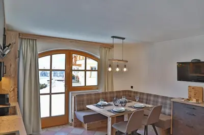 Ein Sitzbereich in der Unterkunft Ferien Bauernhof Maurachhof