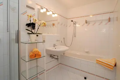 Ein Badezimmer in der Unterkunft Dachstein West Hotel GmbH-Kirchenwirt Russbach