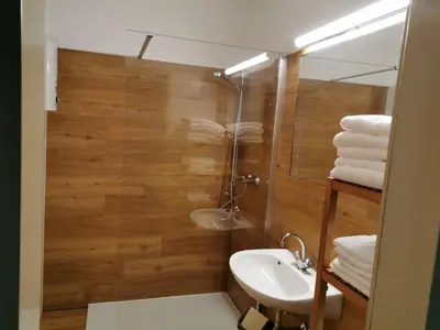 Ein Badezimmer in der Unterkunft appartementen Haus Bergblick