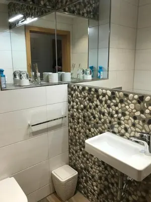 Ein Badezimmer in der Unterkunft Platzhirsch
