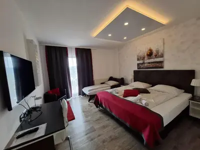 Ein Bett oder Betten in einem Zimmer der Unterkunft Gasthof Alpenblick