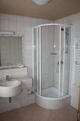 Ein Badezimmer in der Unterkunft Alpengasthof Grimmingblick