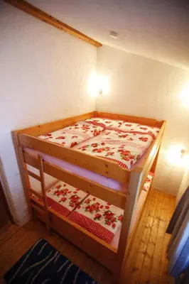 Ein Bett oder Betten in einem Zimmer der Unterkunft Kesslerhütte