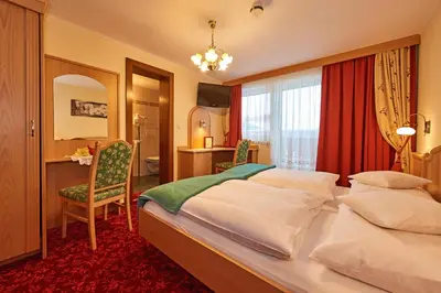 Ein Bett oder Betten in einem Zimmer der Unterkunft Pension Bartlbauer