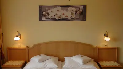Ein Bett oder Betten in einem Zimmer der Unterkunft Pension Bartlbauer