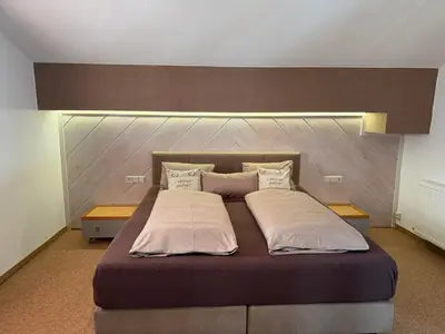 Ein Bett oder Betten in einem Zimmer der Unterkunft Haus Melody