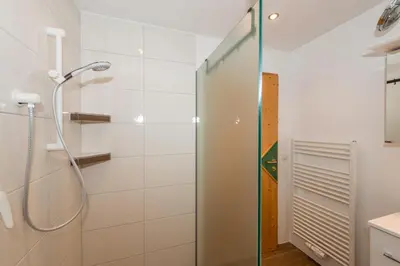 Ein Badezimmer in der Unterkunft Haus Melody