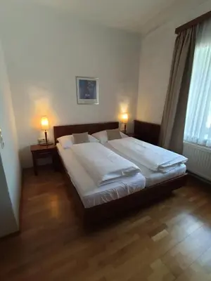 Ein Bett oder Betten in einem Zimmer der Unterkunft Gasthof Post