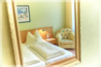 Ein Bett oder Betten in einem Zimmer der Unterkunft Gasthof Blasl