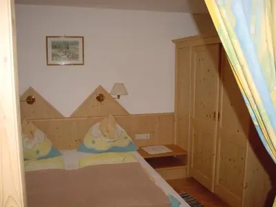 Ein Bett oder Betten in einem Zimmer der Unterkunft Pension - Bauernhof