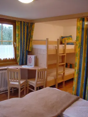 Ein Bett oder Betten in einem Zimmer der Unterkunft Pension - Bauernhof