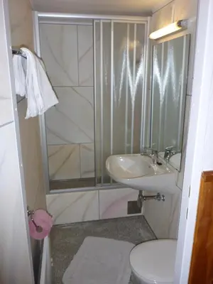 Ein Badezimmer in der Unterkunft Pension - Bauernhof