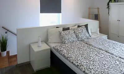 Ein Bett oder Betten in einem Zimmer der Unterkunft Ferienwohnung in Seewalchen