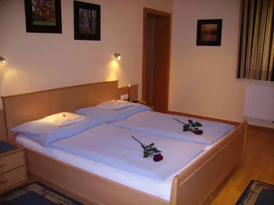 Ein Bett oder Betten in einem Zimmer der Unterkunft Gästehaus Eßl