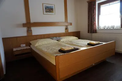 Ein Bett oder Betten in einem Zimmer der Unterkunft Gästehaus Eßl