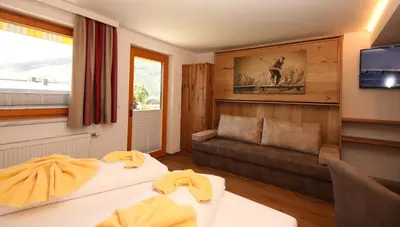 Ein Sitzbereich in der Unterkunft Aparthotel DAS Hochkönig