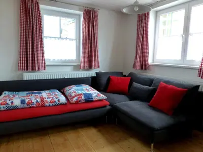Ein Sitzbereich in der Unterkunft Appartment Almenliesl