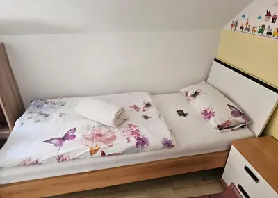 Ein Bett oder Betten in einem Zimmer der Unterkunft Haus Pfeifenberger
