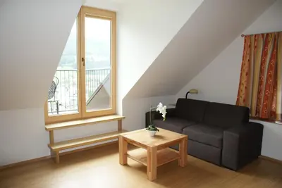 Ein Sitzbereich in der Unterkunft Premium Appartements Di Bora