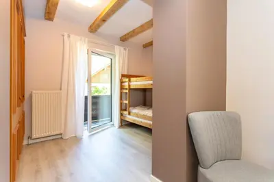Ein Bett oder Betten in einem Zimmer der Unterkunft Hotel Landhaus Lungau