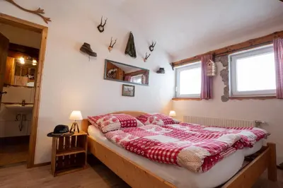 Ein Bett oder Betten in einem Zimmer der Unterkunft Almhaus Dachsteinblick am Feuerkogel
