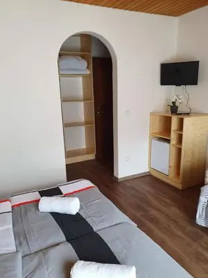 Ein Bett oder Betten in einem Zimmer der Unterkunft Pension INGE