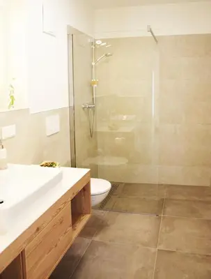 Ein Badezimmer in der Unterkunft TROGER special Appartement