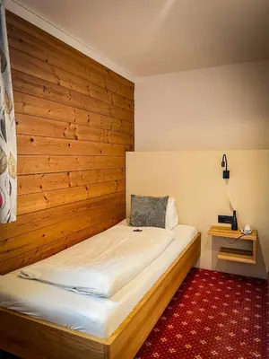 Ein Bett oder Betten in einem Zimmer der Unterkunft Gasthof-Hotel Bramosen