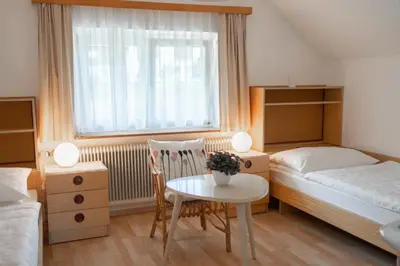 Ein Bett oder Betten in einem Zimmer der Unterkunft Ferienwohnung Meliessnig