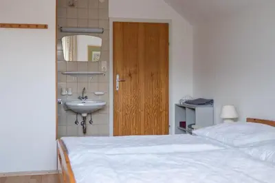 Ein Bett oder Betten in einem Zimmer der Unterkunft Ferienwohnung Meliessnig