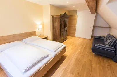 Ein Bett oder Betten in einem Zimmer der Unterkunft Hotel Weissenstein
