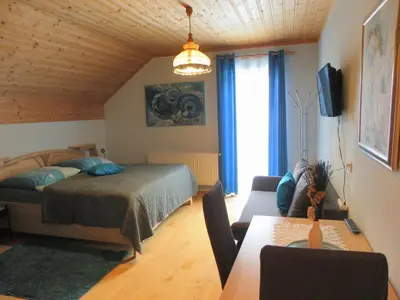 Ein Bett oder Betten in einem Zimmer der Unterkunft Apartment zum Wasserfall