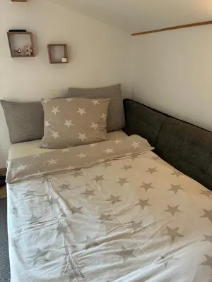 Ein Bett oder Betten in einem Zimmer der Unterkunft Ferienwohnung Diwoky