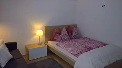 Ein Bett oder Betten in einem Zimmer der Unterkunft Appartement Erlbacher